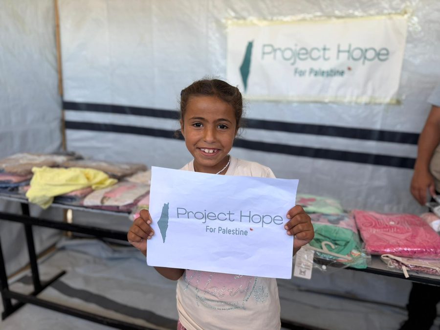 A girl at a Project Hope clothing distribution in Gaza