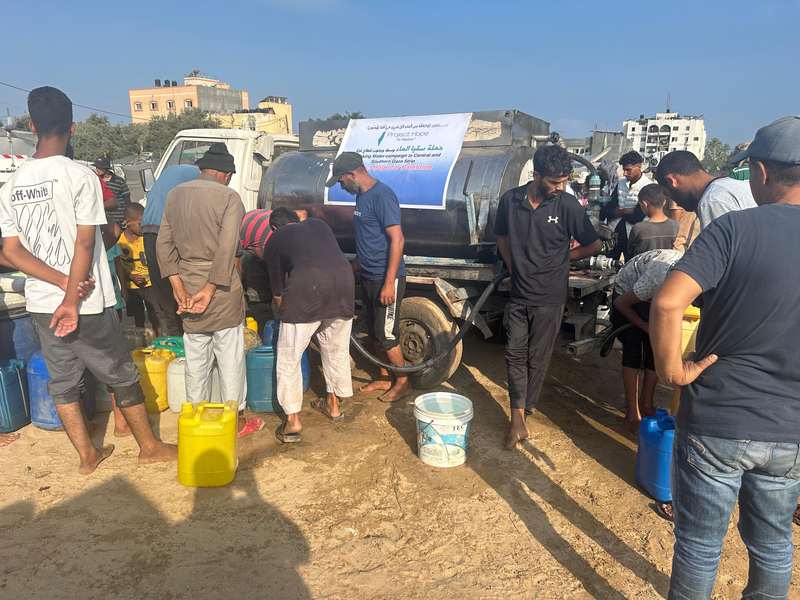 A Project Hope drinking-water distribution by tanker in Gaza